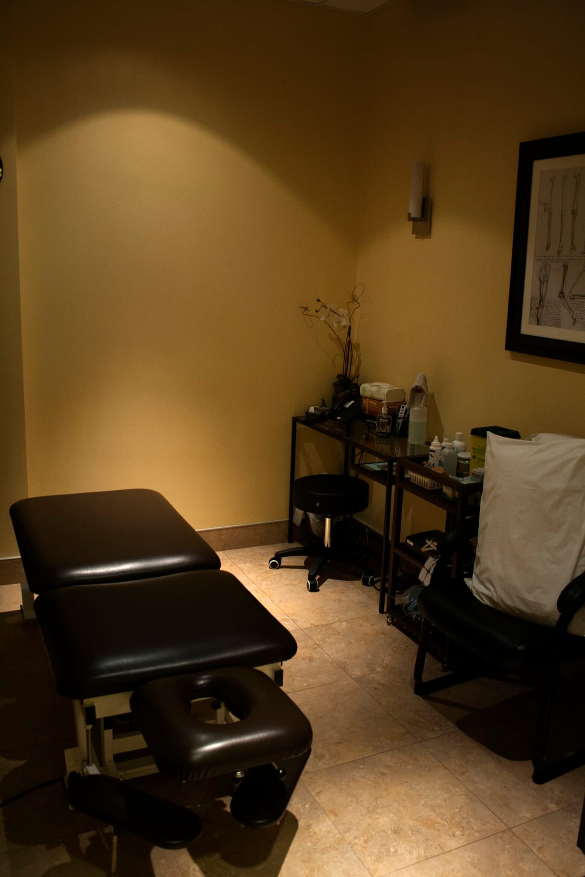 One of the clinic's private treatment rooms, with the table set up and ready